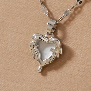 Minimalist liquid metal heart pendant necklace with irregular molten silver finish