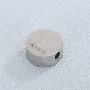 Minimalist stainless steel cylindrical bead with G.STEEL engraving and hole for jewelry making