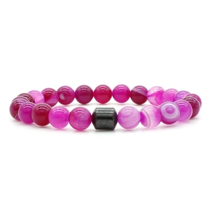 Detailed view of pink striped agate beads with a central grey hematite cylinder bead