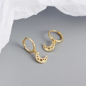 Close-up of gold-plated S925 silver hoop earrings with hollow moon and star charms