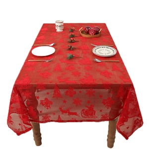 Festive red lace Christmas tablecloth featuring reindeer and tree patterns for party decor