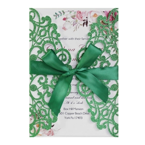 Emerald glitter laser cut wedding invitation with emerald ribbon at Box Hill Mansion