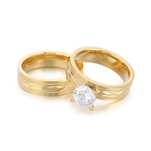Gold-plated stainless steel couple rings set with diamond and engraved grid patterns