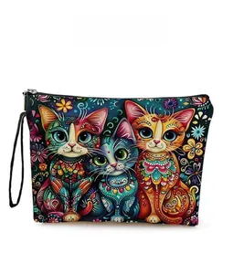 Detail showing colorful cat and floral pattern print on the functional makeup bag