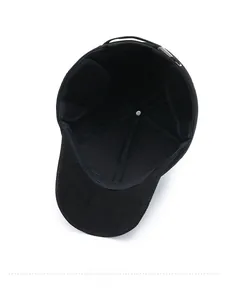 Interior view of black winter baseball cap featuring warm fleece lining and ear flaps