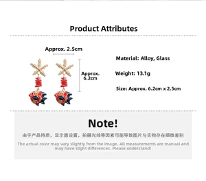 Detail view of starfish and fish earrings showing dimensions 6.2cm height and weight 13.1g