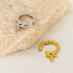 Macro view of 18K gold and silver horseshoe clasp connectors for DIY jewelry making