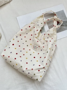 Sac fourre-tout en toile blanc cassé à pois colorés et large bandoulière