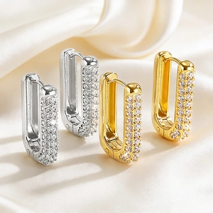 U-shaped stainless steel hoop earrings with micro-pave cubic zirconia in gold and silver