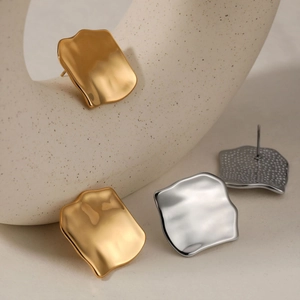 Minimalist irregular square stud earrings with gold and silver hammered metal texture