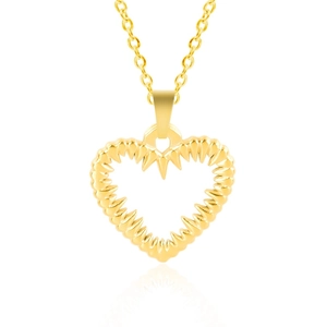 Macro detail of golden stainless steel heart pendant with unique spiked textured edges