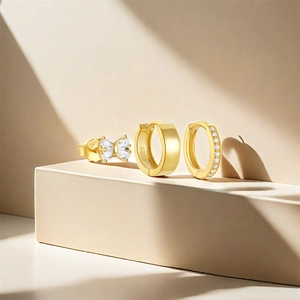 Detailed view of S925 silver gold butterfly studs and cubic zirconia hoop earrings set