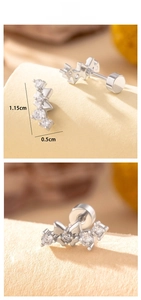 Detailed view of butterfly stud earrings with dimensions 1.15cm x 0.5cm and screw back