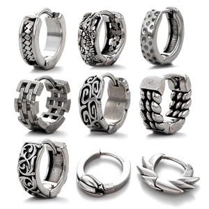 Various retro stainless steel hoop earrings with engraved dragon and geometric patterns