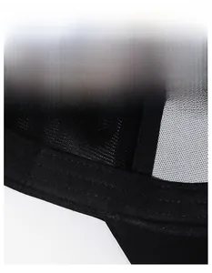 Detail view of widened sweatband and breathable mesh lining of a black baseball cap