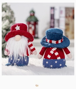 Detail showing front and back views of Patriotic Gnome plush dolls with star and stripe patterns