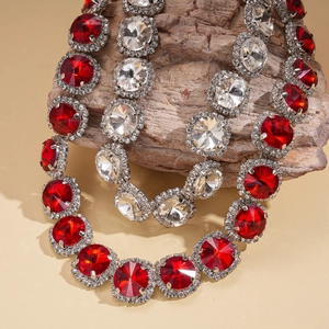 Two-piece set of geometric round cut ruby and diamond halo pendant necklaces for women