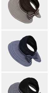 Detail of three striped sun visors with bows in coffee, navy, and black colors