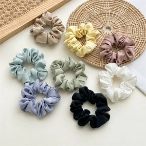 Eight-piece satin scrunchies set in assorted pastel colors for women hair styling