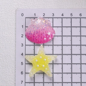Pink glitter shell and yellow starfish resin accessories for DIY hair clips and crafts