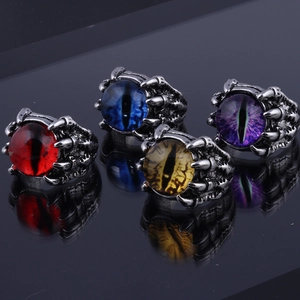 Gothic punk dragon claw rings with vibrant devil eyes in red blue yellow and purple