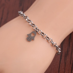Silver Hamsa hand charm bracelet with heart cutout on stainless steel chain link