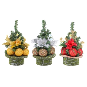 Mini Christmas tree set with pine needles, shiny ornaments and festive ribbons