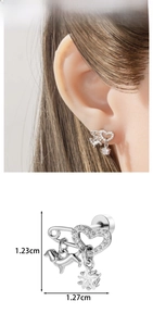 Silver safety pin earring with heart and dog pendants and dimensions of 1.23cm and 1.27cm