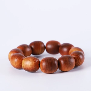 Aged Thuja wood beaded bracelet with natural oil textures and cloud patterns