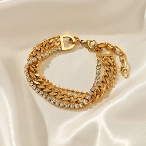 Three-layer gold stainless steel chain bracelet with crystal accents and D pendant