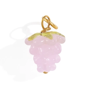 Detailed view of a semi-transparent pink grape pendant with golden metal hanging loop