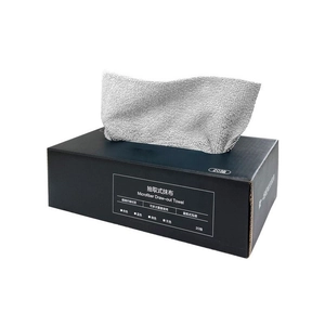 Microfiber draw-out cleaning cloth in a black dispenser box for kitchen surface use