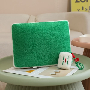 Plush green mahjong tablet sleeve and matching storage pouch with Happy Smile tag