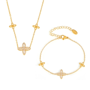 Golden stainless steel four-leaf clover jewelry set with sparkling white zircon stones