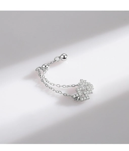 Close-up of 925 sterling silver wave ring featuring a sparkling zircon cloud and chain detail