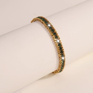Elegant gold titanium steel bracelet with green square gemstones and double-row chain design