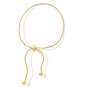 Minimalist gold snake bone chain bracelet with adjustable slider and spherical charms