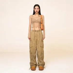 Retro khaki cargo parachute pants paired with a stylish knit long sleeve crop top