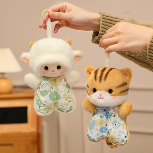 Cute plush animal charms of a white lamb and striped tiger in floral outfits