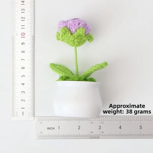 Detailed size view of handmade crochet purple flower in white pot showing 11cm height