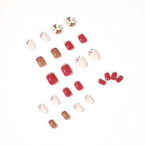 Red and mocha leopard print press-on nails set with pearl and white bow accents