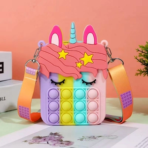 Unicorn silicone crossbody bag for girls with pop-it fidget bubbles and adjustable strap