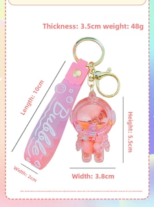 Pink astronaut liquid quicksand keychain specifications with 10x5.5x3.8cm dimensions