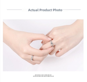 Close-up of minimalist S925 silver rings set with sparkling diamond accents