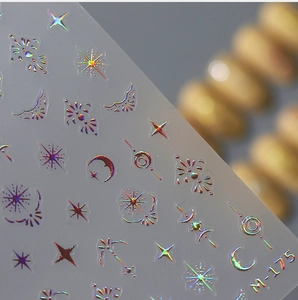 Macro shot of M-175 holographic nail stickers featuring stars and moon geometric patterns