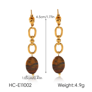 Close-up of vintage tiger eye stone earrings with length and weight measurements