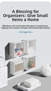 Wall-mounted white organizer with transparent flip covers for cotton swabs and hair ties