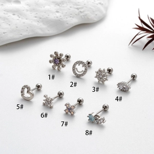 Set of 8 silver stainless steel stud earrings with zirconia hearts and geometric shapes