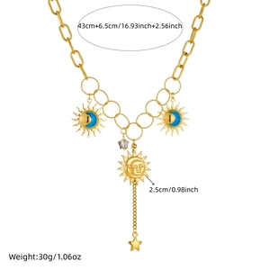 Gold plated O-chain necklace featuring sun, moon, and star pendants with blue enamel