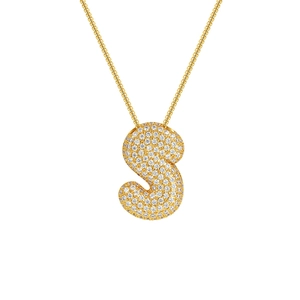 Macro detail of 18K gold plated letter S pendant featuring sparkling zircon stones